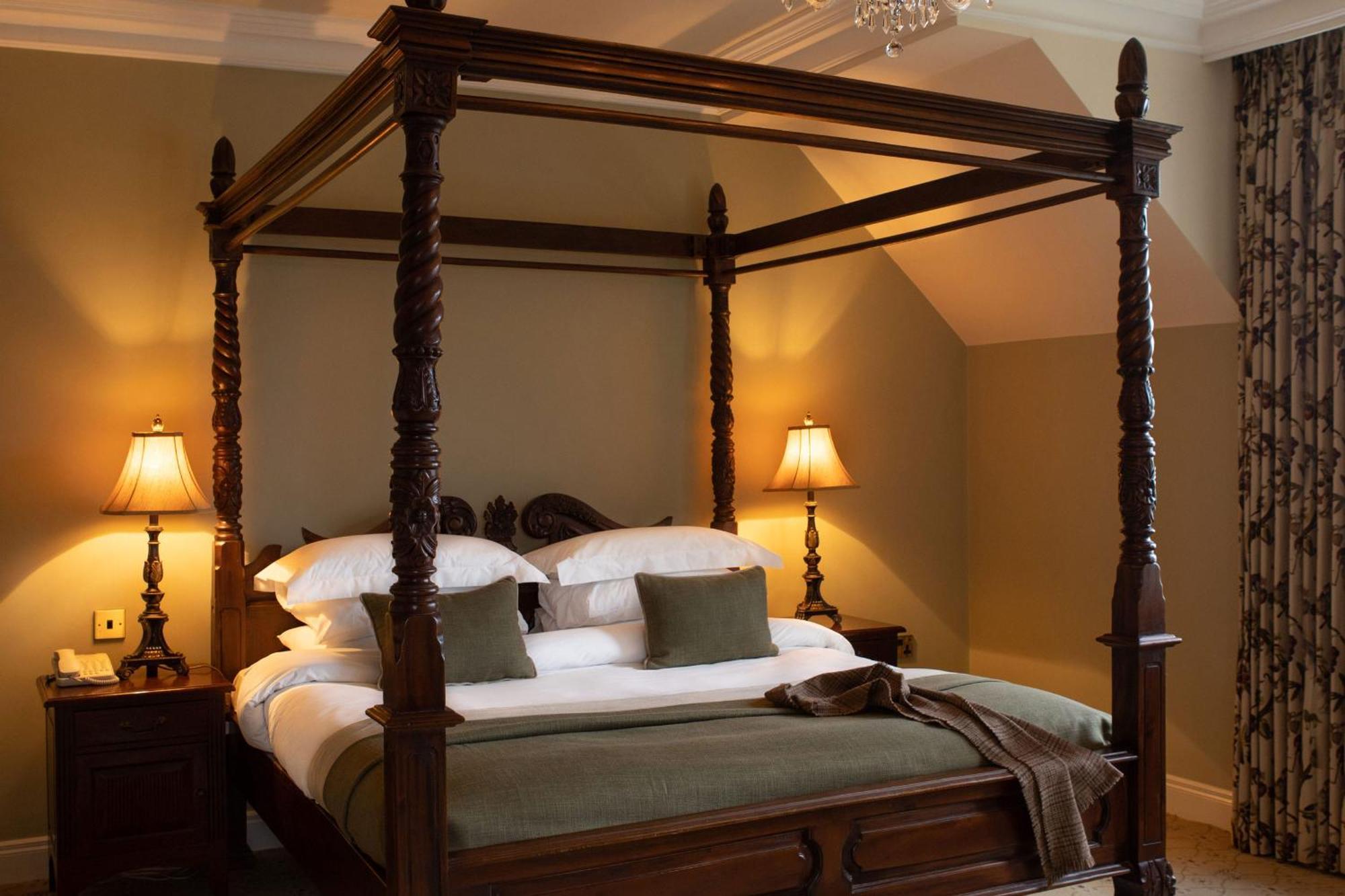 Lough Erne Resort Enniskillen Exterior photo A four-poster bed